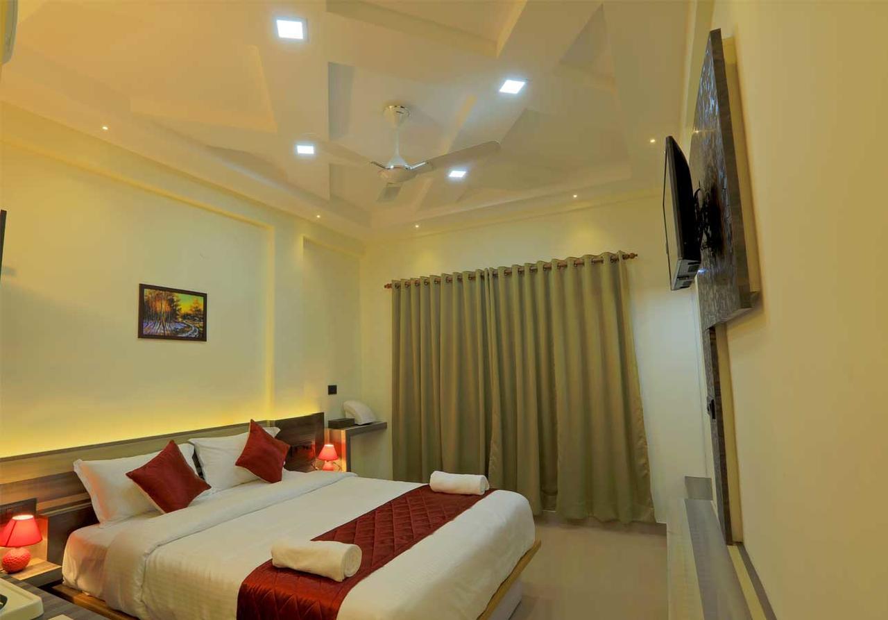 Kenz Residency Hotel Kochi Exterior foto